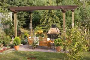 A nice, party-ready backyard with shaded patio and picnic table