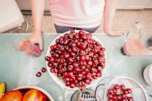 Bowl of fresh cherries on a kitchen countertop